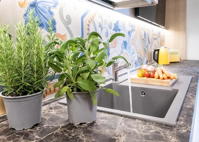 Renzi 23 Апартаменты Каттолика